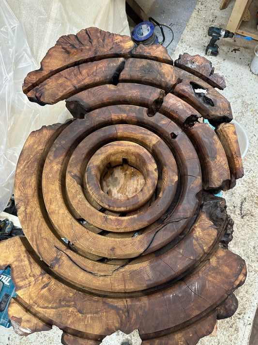 Coming Soon - “Butter Ring” Ancient Elm carved round table.